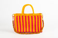 Aura · Fucsia y amarillo